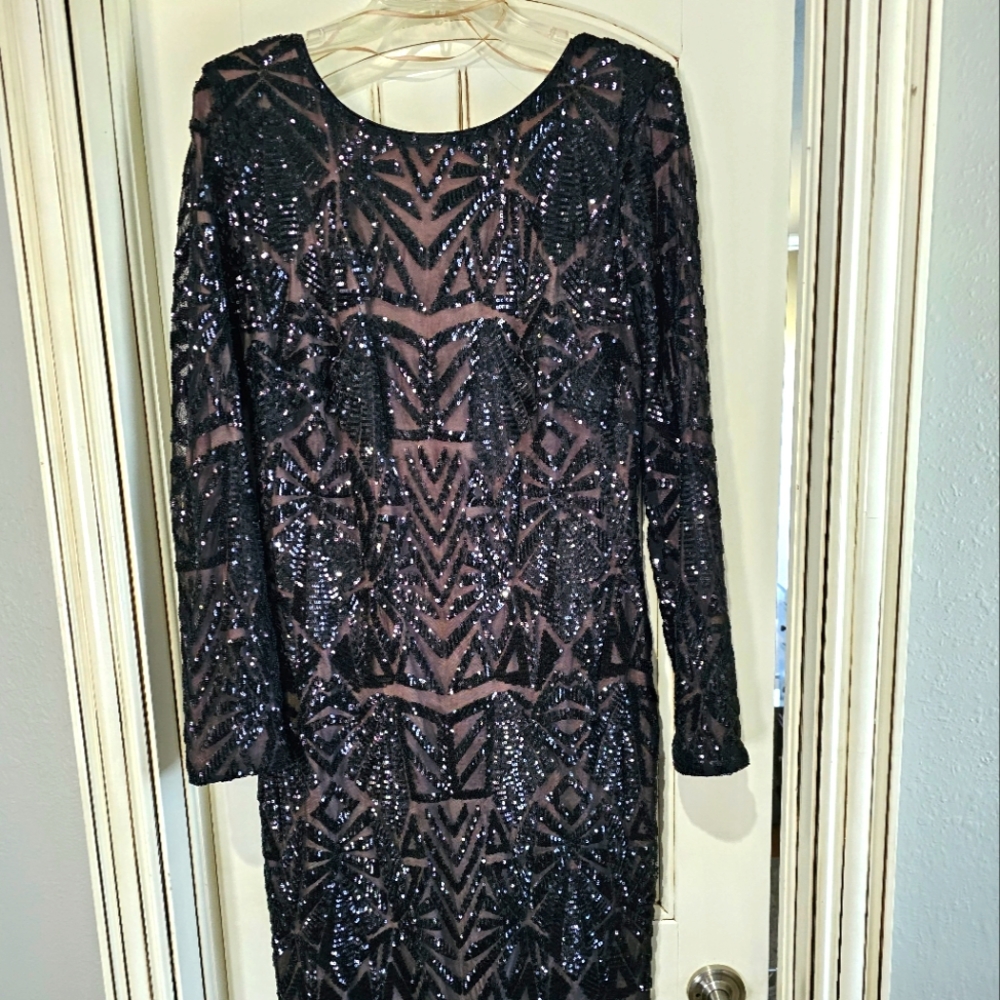 Gorgeous cocktail, semi-formal dress. Size 16, black sequin over nude base.